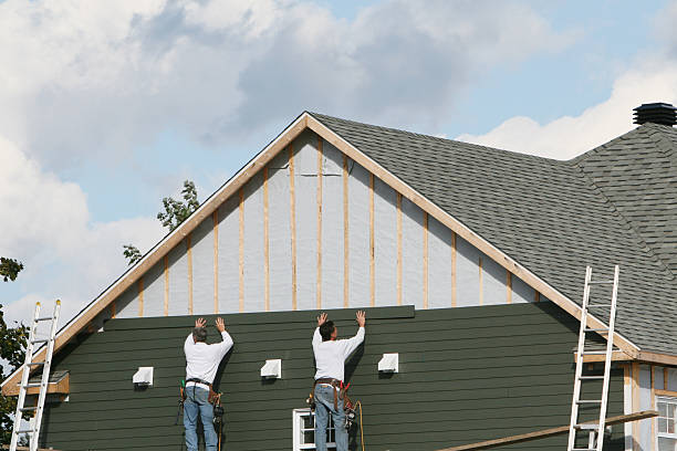 Professional Siding technician working in Strongstown, PA